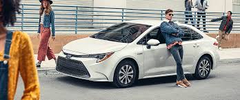 Panda Used Cars technician conducting 120-point inspection on Toyota Corolla Hybrid