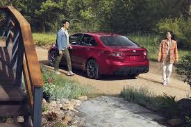 Toyota Corolla LE vs XLE vs Hybrid SE side by side at Tianjin port